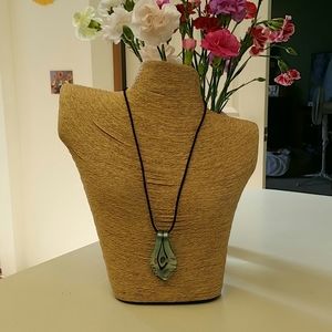 Glass  necklace on a black cord/beaded necklace